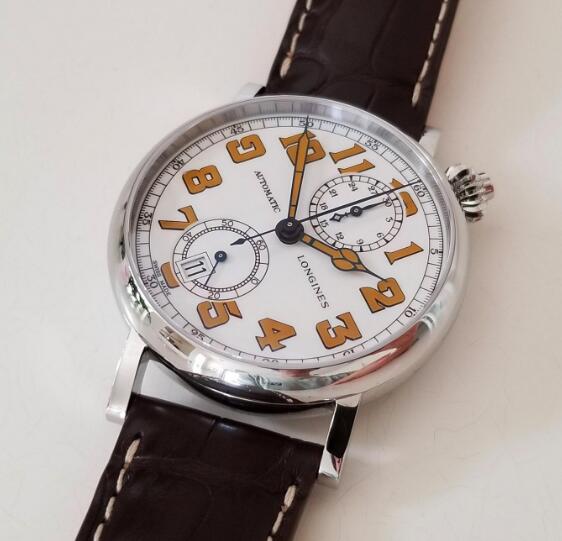 The vintage Arabic numerals hour markers are contrasted to the white dial.