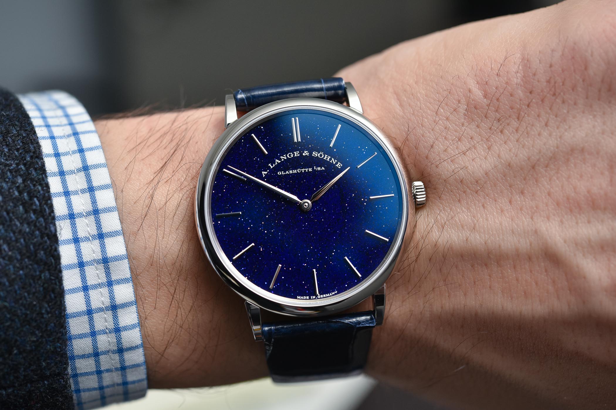The blue dial copy watch has blue strap.